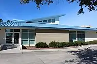 The exterior of the building which houses Finance Park, as seen from the Stavros Institute's parking lot.