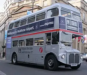 One of the twenty-five London Routemaster buses painted silver to commemorate the Silver Jubilee of Queen Elizabeth II