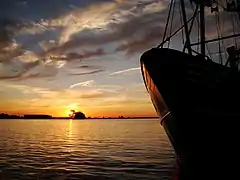 Fishingboat at the Dock in Bunschoten at sunset