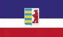 The flag of "Subcarpathian Ruthenia-Zakarpattia" (Rusyn organization in Ukraine) with the coat of arms.