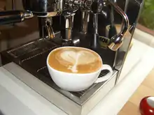 A flat white featuring latte art