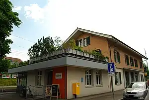 Two-story building with slanted roof