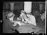 In January and February 1937, Dick photographed the Flint Sit-Down Strike for the FSA.  Many of his photographs, like this one, are of ordinary life during the strike.