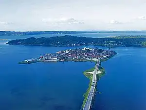 Causeway connecting the island .