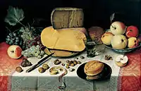 Ontbijtje still life from 1610 at the Frans Hals Museum, showing a Dutch breakfast with cheese, bread, nuts and fruit, served on a fine white linen napkin protecting the tablecloth, which is a red or karmozijn example of a kind popular in 17th-century Haarlem