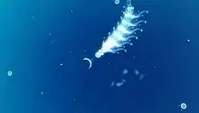 A white multi-segmented worm-like creature in the top center of the screen is shown over a blue background. Small circular creatures surround it, and below it are smaller, blurry worm-like creatures.