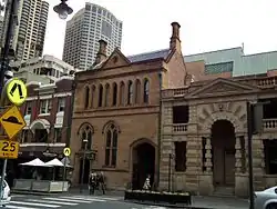 The former ES&A Bank branch building (middle) and Old Police Station (right)