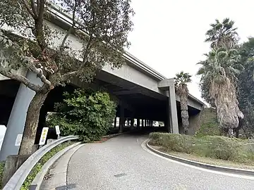 An auto ramp entering the former Inglewood–Venice freight train tunnel/lane along Centinela Avenue, under the 405 freeway
