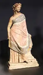 Greek figurine of a beautifully dressed young woman, 3rd of 2nd century BC, terracotta with kaolin and traces of polychromy, Liebieghaus, Frankfurt, Germany