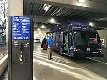 A bus reading "rental car center" seen at a U.S. airport
