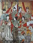 Women depicted in the Fresco in the Hall of King Mingying. Han women wore elbow-length sleeves, cross-collar upper garment over a long-sleeved blouse; the abbreviated skirts were popular in Yuan.