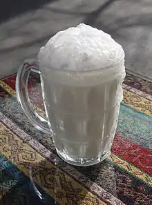 Ayran is a savory yogurt-based beverage, traditionally served cold and is sometimes carbonated and seasoned with mint and salt.