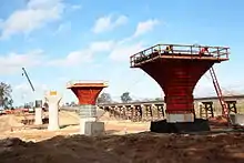 Construction in January 2016.  The BNSF Railway bridge is visible in the background.