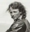 Young woman with wind-blown hair