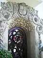 Sculpted plaster entrance to the Temple Mansion