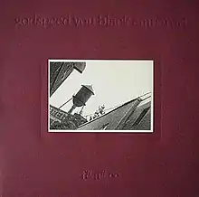 A dark maroon album cover with a small rectangular black-and-white photograph of a water tower in the center.