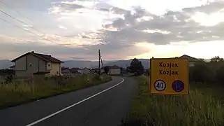 Sign hailing entrance on road into Kozjak
