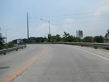 Steel pole 474 near Dulalia Overpass in Valenzuela. Originally had a triangle design from 1994 to 2007, the said pole was changed to flag design when it was replaced by newer and higher ones due to the construction of an overpass mentioned before (and also retiring NAPOCOR-era steel pole 474).