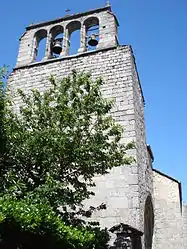 The bell tower of the church in Génolhac