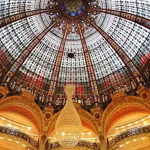 The art-nouveau cupola of Galeries Lafayette (1912) provides natural light to the levels around the courtyard below.