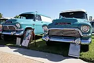 1957 GMC 100 Panel and Carryall at a car show in Florida