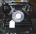 GPO Telephone 232F attached on top of a bell set 26
