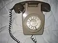 741 wall-mounted two-tone grey telephone