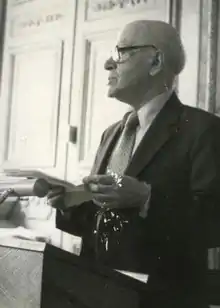 Preil reading his work in 1983.