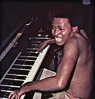 Gaby Lita Bembo playing piano in the late 1970s
