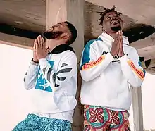 A picture of Ghanaian music duo Gallaxy at a video shoot