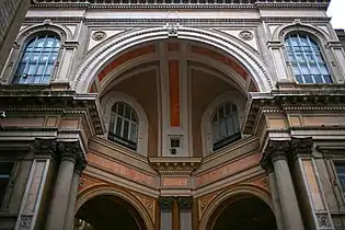 Detail of the exedra at the exit of the gallery on Piazza della Scala