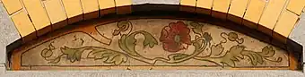 Sgraffito depicting red poppy flowers