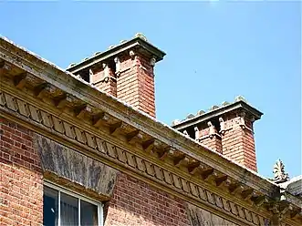 Garthmyl Hall. Frieze and chimney stacks