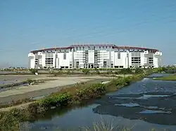 View of stadium from the rice fields.