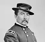 picture of a serious-looking American Civil War general with mustache and odd hat
