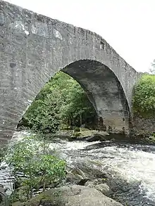 Bridge detail. The plaque denoting the bridge's year of completion is also in view