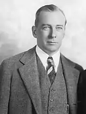 George Abbott wearing a three-piece suit