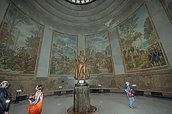 Statue and murals in the center