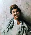 Smiling woman from Bou Saâda, date unknown