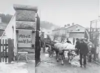 German civilians remove corpses from the main camp.