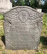 An elaborate schist gravestone carved by Gershom Bartlett of Bolton.