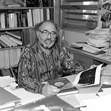 Picture of Gerson Goldhaber at his desk at Lawrence Berkeley Laboratory