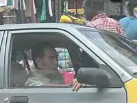 Chinese taking taxi in Ghana
