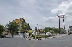 Wat Suthat (left) with Giant Swing (right)