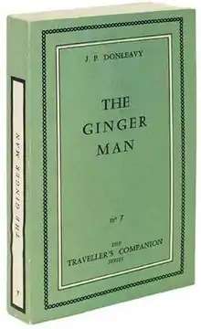 A green-covered book with The Ginger Man on the front