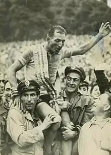 Gino Bartali, winner, brought in triumph to Milan