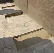 Depressions in the floor of the Valley Temple that once held the statues of Khafre