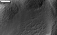 Possible Glacial Cirque in Hellas Planitia, as seen by HiRISE, under the HiWish program.  Lines are probably due to downhill movement.