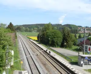 Double-tracked railway line with side platforms