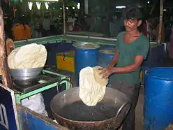 Deep fried papad being prepared at an exhibition in Guntur, India